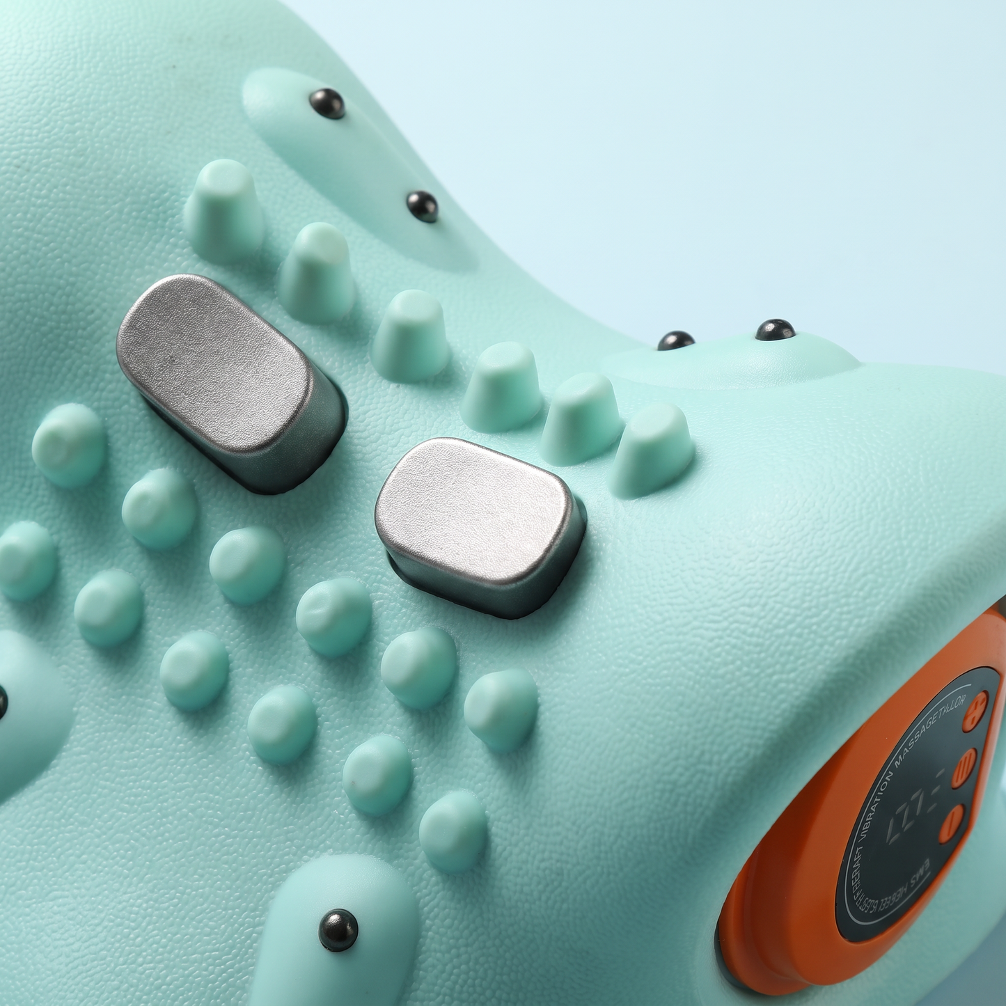 Gros plan sur les electrodes EMS et les picots de massage